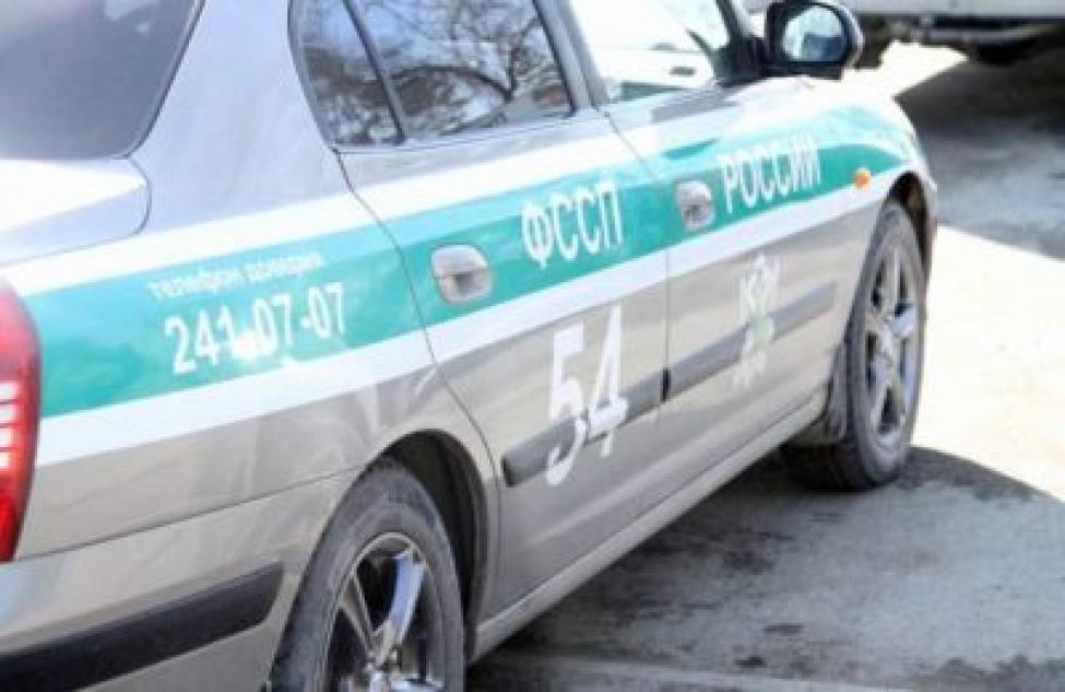 Должник остался без машины посреди дороги в Новосибирской области