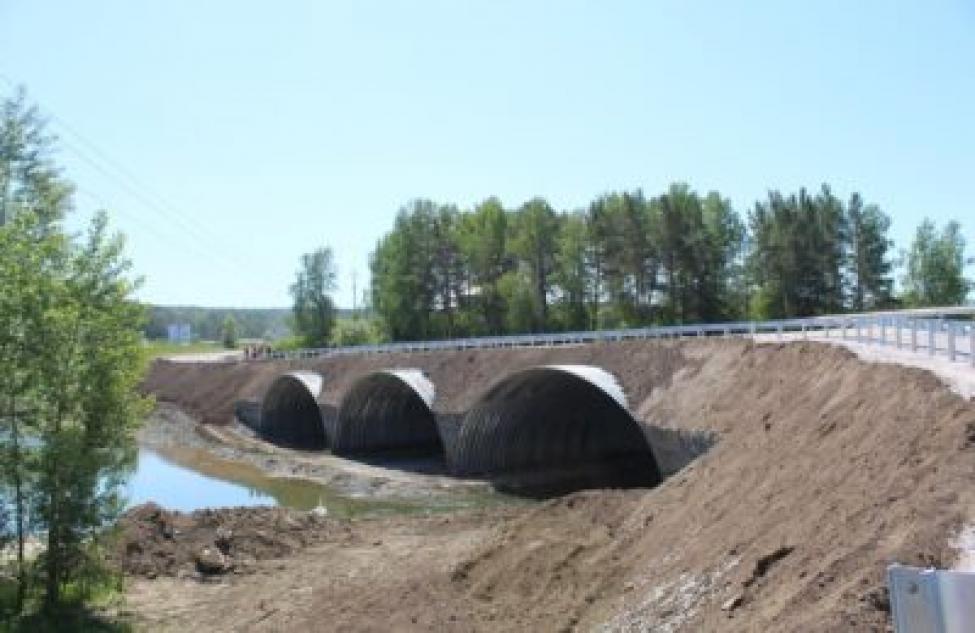 Уникальный арочный мост-долгострой открыт для движения под Новосибирском